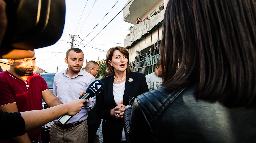 President Jahjaga gives an interview with local media after visiting a girls' club in Fushë Kosovë, a town outside of Pristina that is home to a large Roma, Ashkali and Egyptian community [Valerie Plesch/Al Jazeera]