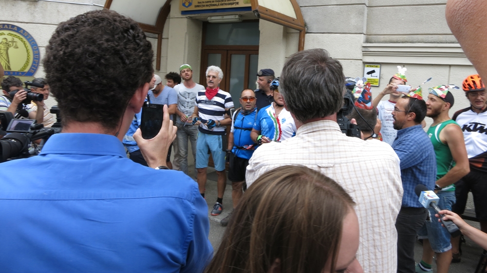 Cyclists demonstrate outside DNA office against the arrest of Bucharest Mayor, Sorin Oprescu [Glenn Ellis/Al Jazeera]