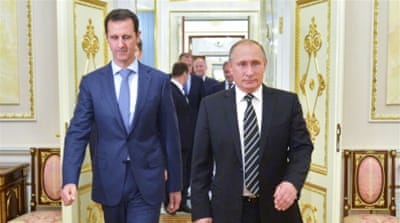 Russian President Vladimir Putin and Syria's President Bashar al-Assad [AP]