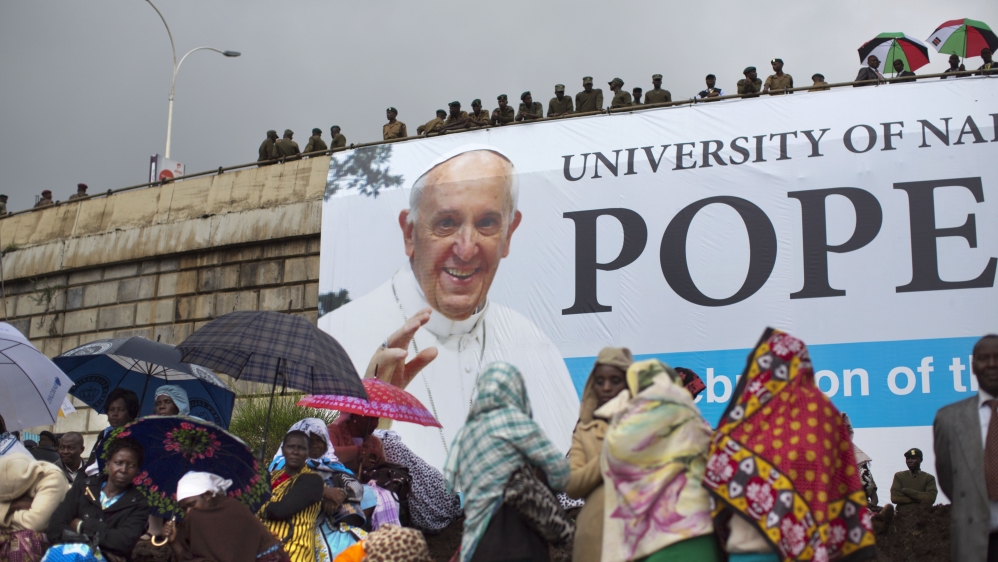 Thousands of Kenyans travelled to Nairobi to attend a Mass held by Pope Francis [Ben Curtis/AP Photo]