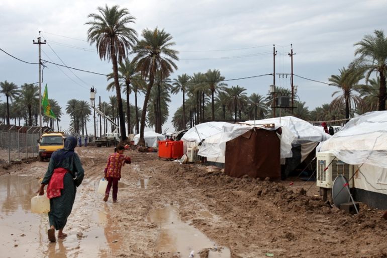 Muddy refugee camps Bahdad, Iraq