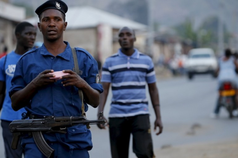 Burundi police patrol the streets of Musaga district in the capital Bujumbura
