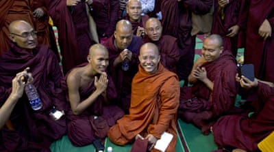 Controversial Buddhist monk Wirathu, centre foreground, who is accused of instigating sectarian violence between Buddhists and Muslims through his sermons [Gemunu Amarasinghe/AP]