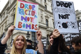Demonstrators protest against British bombing of Syria outside Downing Street in London [EPA]