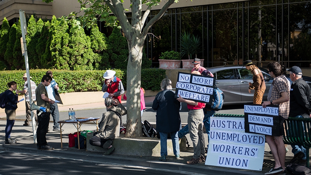 Protests have been held against Australia's welfare programme. [Royce Kurmelovs/Al Jazeera]