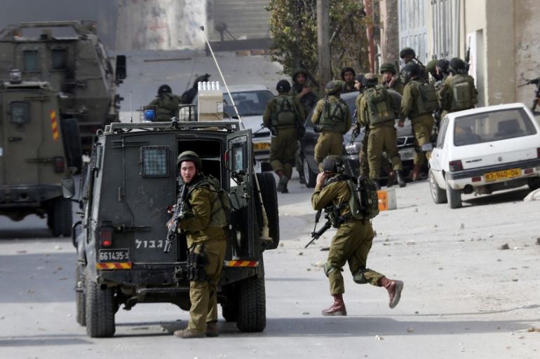 Clashes after a Palestinian knife attacker was shot dead in West Bank