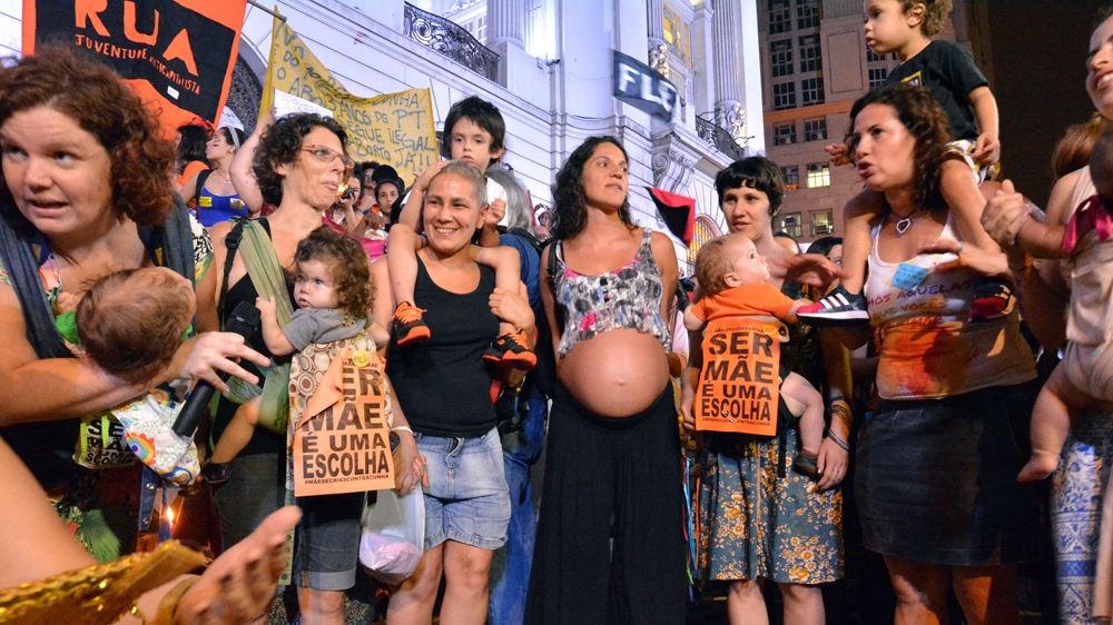 Adriana and Ana joined a women's protest against the proposed changes to Brazil's abortion law [Priscilla Moraes/Al Jazeera]