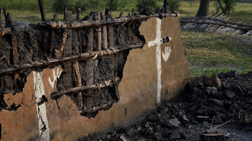 The charred remains of a church in Thonyoor, in rebel-held Leer county [Jason Patinkin/Al Jazeera] 