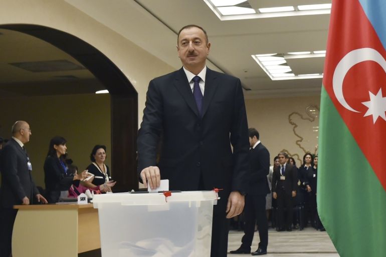 Azerbaijan''s President Aliyev casts his ballot at polling station during parliamentary election in Baku