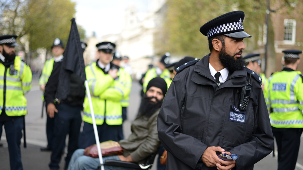 Police guarding Downing Street [Lydia Noon/Al Jazeera]