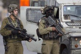 Israeli security forces stand guard at the Jalama checkpoint near Jenin