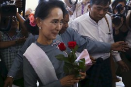 National League for Democracy party leader Aung San Suu Kyi arrives for Myanmar''s first parliament meeting