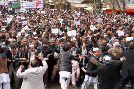 Afghan men protest to condemn the killing of seven Hazara ethnic minority that were kidnapped and killed by Islamic State militants in Ghazni province