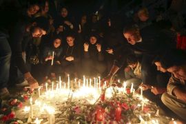 Please don''t use - People light candles during a vigil at the site of the two explosions that occurred on Thursday in the southern suburbs of the Lebanese capital Beirut