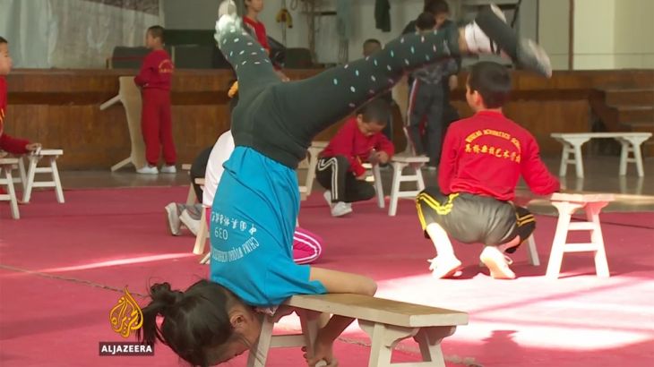 Bending over backwards to become China''s next acrobats