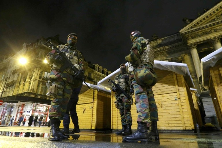 Belgian soldiers patrol in central Brussels [REUTERS]