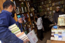 Egyptian select books at a book store in Cairo, Egypt [Getty]