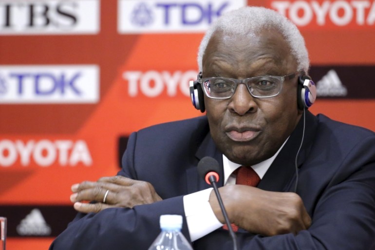 File photo of then-outgoing President of IAAF Diack attending a news conference in Beijing