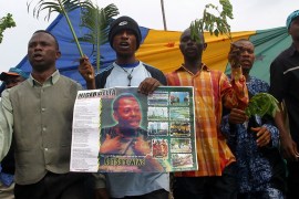 Protesters march to remember the 10th anniversary of a military junta''s execution of Ken Saro-Wiwa
