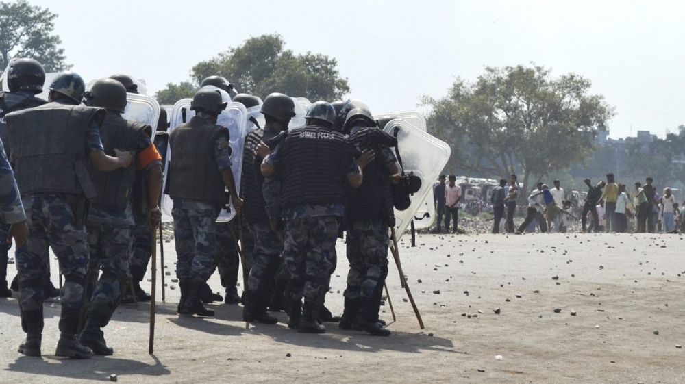 Police have been accused of using excessive force against Madhesi protesters [EPA]
