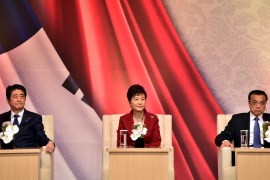 South Korean President Park Geun-hye, Japanese Prime Minister Shinzo Abe and Chinese Premier Li Keqiang attend a business summit in Seoul