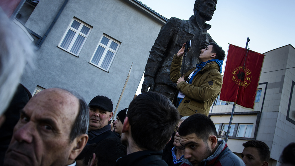 Between 2,500 and 4,000 protesters gathered in Gjilan, 50km outside the capital. Ismajl Kurteshi, a Vetevendosje MP, defied house arrest to make a public speech [Benas Gerdziunas/Al Jazeera]