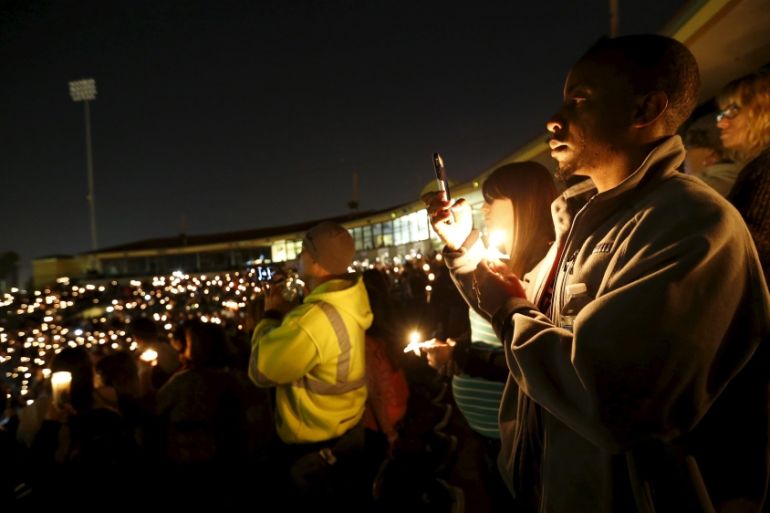 Attendees reflect on the tragedy of Wednesday''s attack during a candlelight vigil in San Bernardino, California