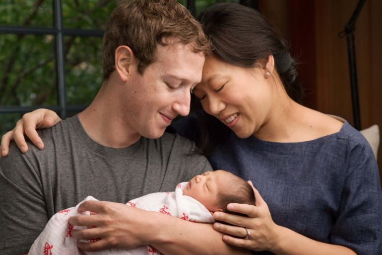 Mark Zuckerberg and his wife Priscilla are seen with their daughter named Max [REUTERS]