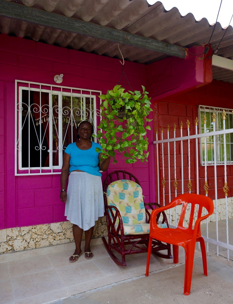 Seletina worries about whether she can afford the bus fare to take her sick grandson to a clinic in Cartagena [Julia Zulver/Al Jazeera]