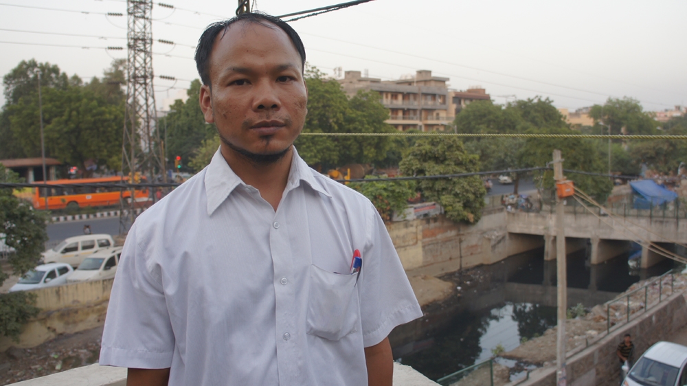 When Lal Pian Thanga first moved to the city, he was employed in a bag manufacturing factory, working nine hours shifts for Rs 3,500 ($55) a month [Harsimran Gill/Al Jazeera] 