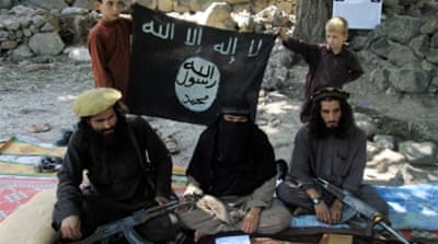 ISIL fighters at an undisclosed location in Kunar province, Afghanistan [EPA]