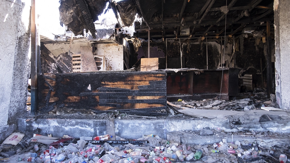 Extortion was common in Juarez, where shops, restaurants and bars were targeted, and those that didn't pay up were torched [Axel Storen Weden/Al Jazeera]