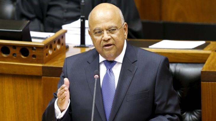 File photo of South Africa''s Finance Minister Gordhan delivering his 2014 budget address at Parliament in Cape Town