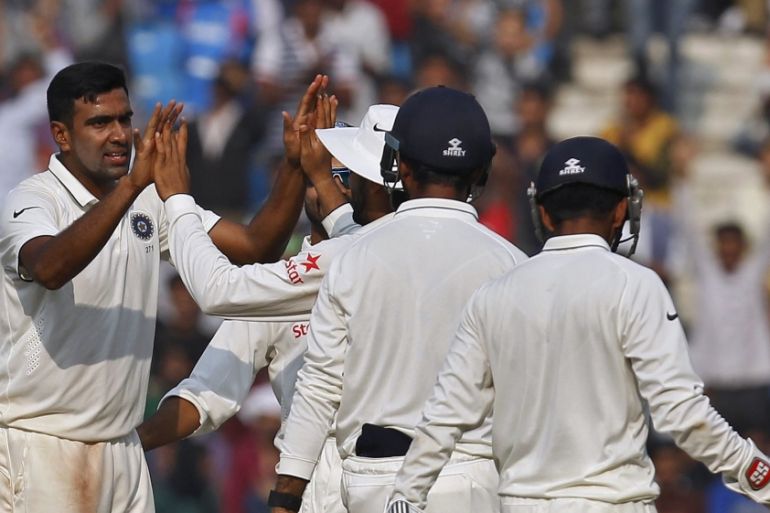 India''s Ashwin celebrates with teammates after taking the wicket of South Africa''s Vilas during the third day of their third test cricket match in Nagpur