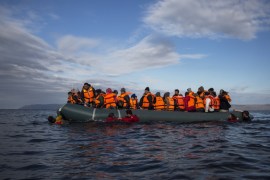 Refugees and migrants arrive on an inflatable vessel to Lesbos