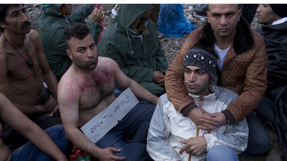 Iranian refugees sewed their mouths shut at the Greek border in protest against being denied entry into Macedonia [Anna Psaroudakis/Al Jazeera]
