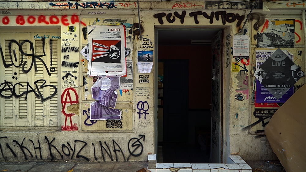 The entrance to the EL CHEf food collective in Athens' Exarcheia neighbourhood [Sorin Furcoi/Al Jazeera]