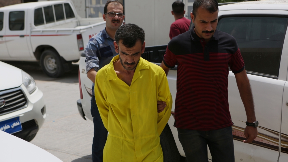 
In July 24 suspected ISIL members were sentenced to death for their alleged role in the killings [Nabil al-Jurani/AP]
