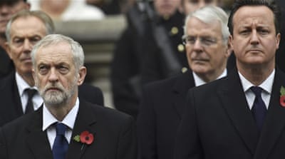 Former Prime Minister Tony Blair, left, stands behind Jeremy Corbyn, as David Cameron stands in front of former Prime Minister John Major [Reuters]