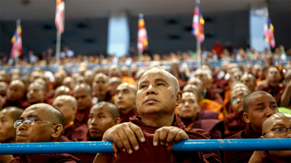 Buddhist monks attend a Ma Ba Tha ceremony to mark the approval of race and religious laws at Thuwunna indoor stadium in Yangon, Myanmar [EPA]