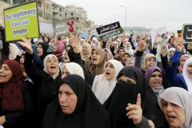 Israeli Arab protesters women shout slogans during a demonstration against the outlawing of the Islamic Movement''s northern branch, in the northern Israeli-Arab town of Umm el-Fahm