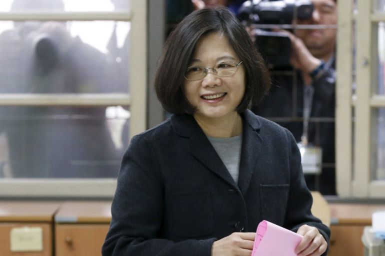 Taiwan''s Democratic Progressive Party (DPP) Chairperson and presidential candidate Tsai Ing-wen casts her ballot at a polling station during general elections in New Taipei, Taiwan
