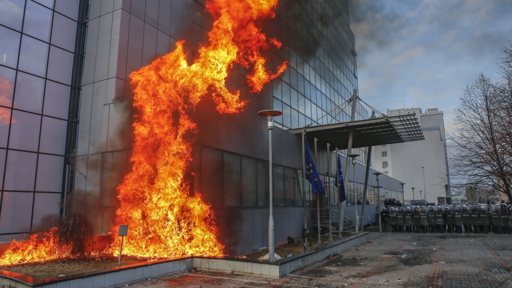 Protesters threw molotov cocktails at the Kosovan government building [EPA/Valdrin Xhemaj]