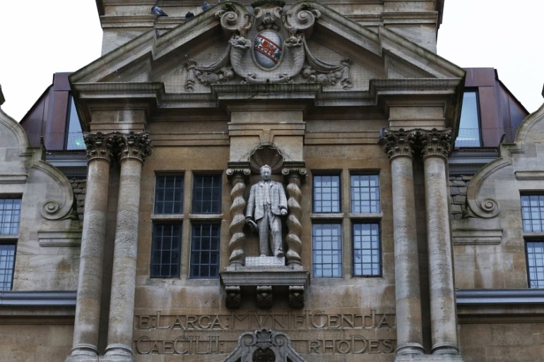 The statue of Cecil Rhodes is seen on the facade of Oriel College in Oxford, southern England [REUTERS]