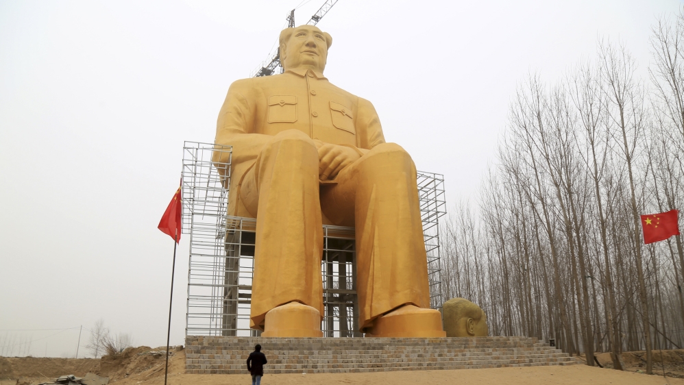 
The gold-painted statue was paid for by a group of local entrepreneurs, Chinese media reported [Reuters]
