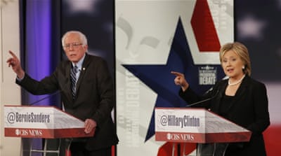 Presidential hopefulls Hillary Clinton (Right) and Bernie Sanders could benefit from an upbeat State of Union report by Obama [Jim Young/Reuters]
