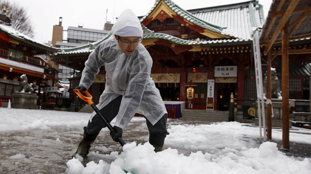 Across the country 250 injuries were reported - many as a result of people slipping over [Toru Hanai/Reuters]
