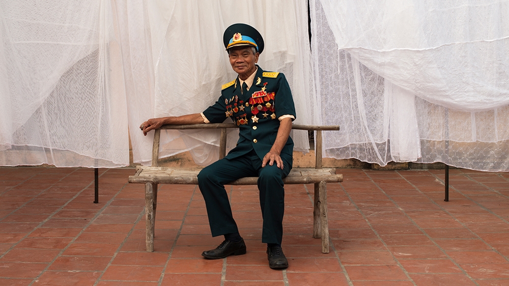 Since retiring from the army in 1990, 78-year-old Dinh The Van has dedicated himself to charity projects in his village in the Hanoi countryside [Vincenzo Floramo/Al Jazeera] 