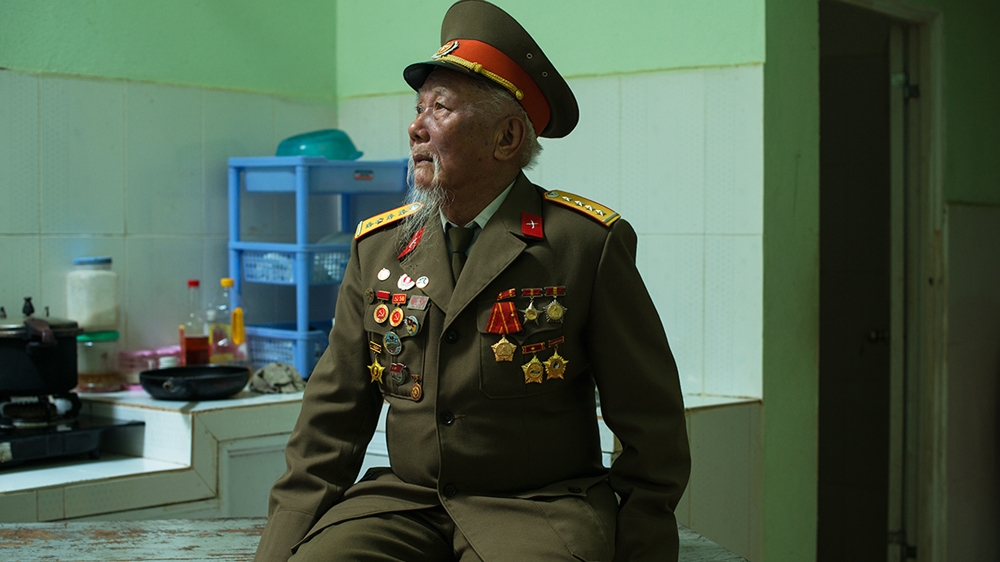 Nguyen Van Thuc, 82, served as a cook. His knowledge of food, acquired from his mother, helped him cook meals for the Viet Minh despite lacking key ingredients [Vincenzo Floramo/Al Jazeera] 