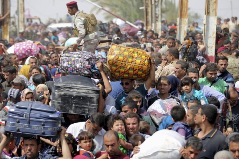 File photo of displaced Sunni people, who fled the violence in the city of Ramadi, arriving on the outskirts of Baghdad